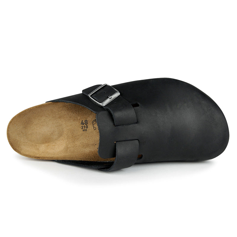 BIRKENSTOCK Boston clog in black oiled leather with contoured cork-latex footbed showcasing a unique patina and comfort.