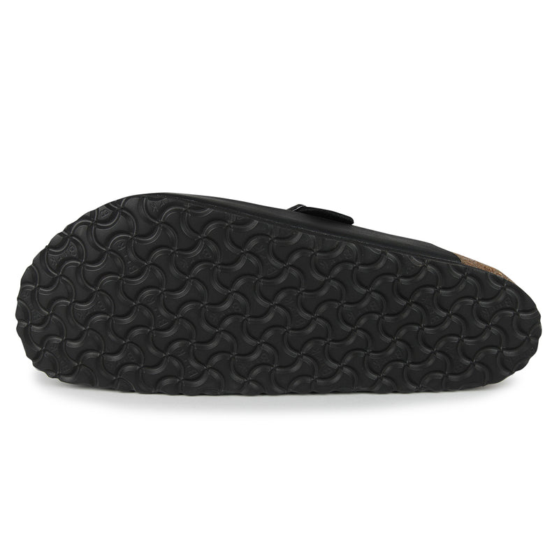 Birkenstock Boston clog sole showing contoured cork-latex footbed and durable tread pattern for support and traction.