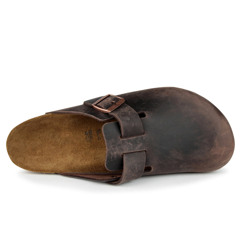 Birkenstock Boston clog in oiled leather with contoured footbed, showcasing unique patina and heritage craftsmanship.