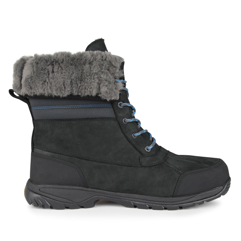 Black quilted nubuck boot with cuffable shaft, plush lining, and Vibram outsole for warmth and waterproof comfort in cold weather.