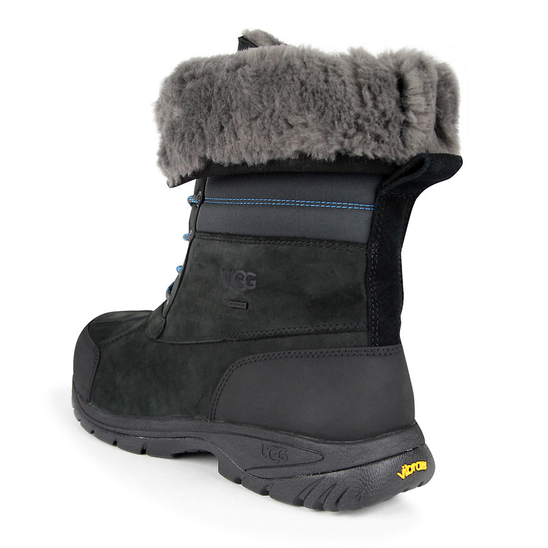 Black Butte Quilted boot with grey plush lining and waterproof Vibram outsole, designed for warmth and durability in cold weather.