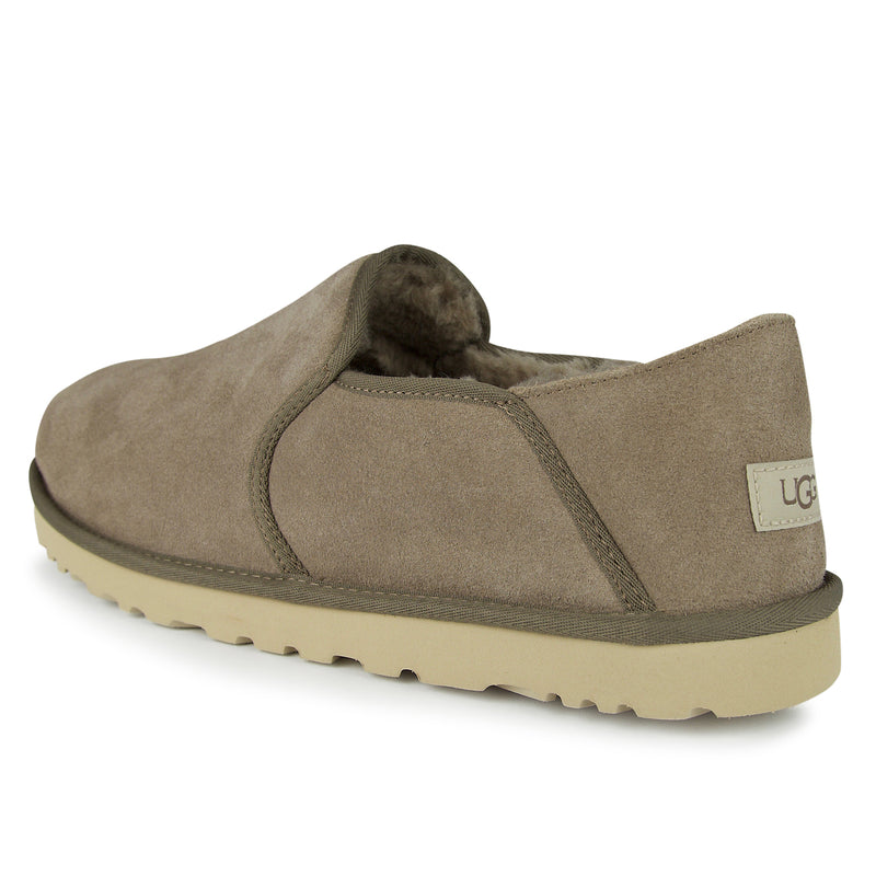 Kenton UGG slipper with suede upper and collapsible heel, showcasing plush wool lining, ideal for indoor or outdoor comfort.